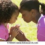 black mother and child prayingmages